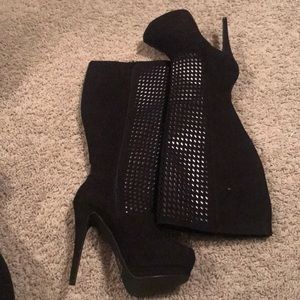 Knee high black boots